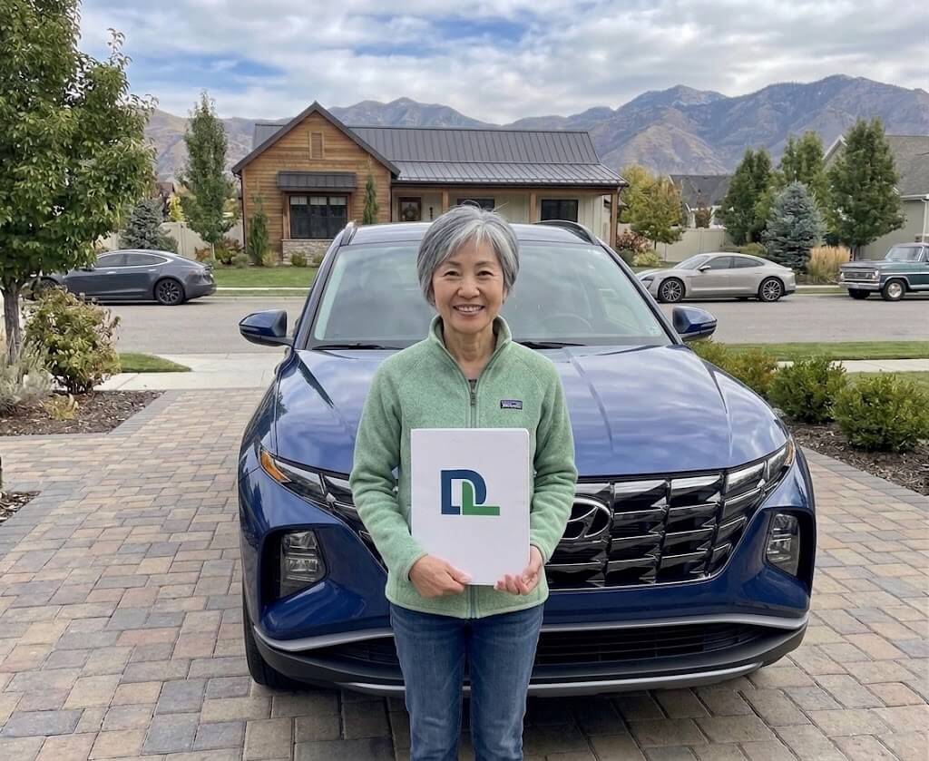 Driver with their new vehicle